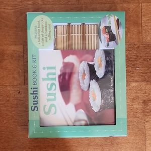 Brand new Sushi book and kit includes chopsticks and bamboo rolling mat